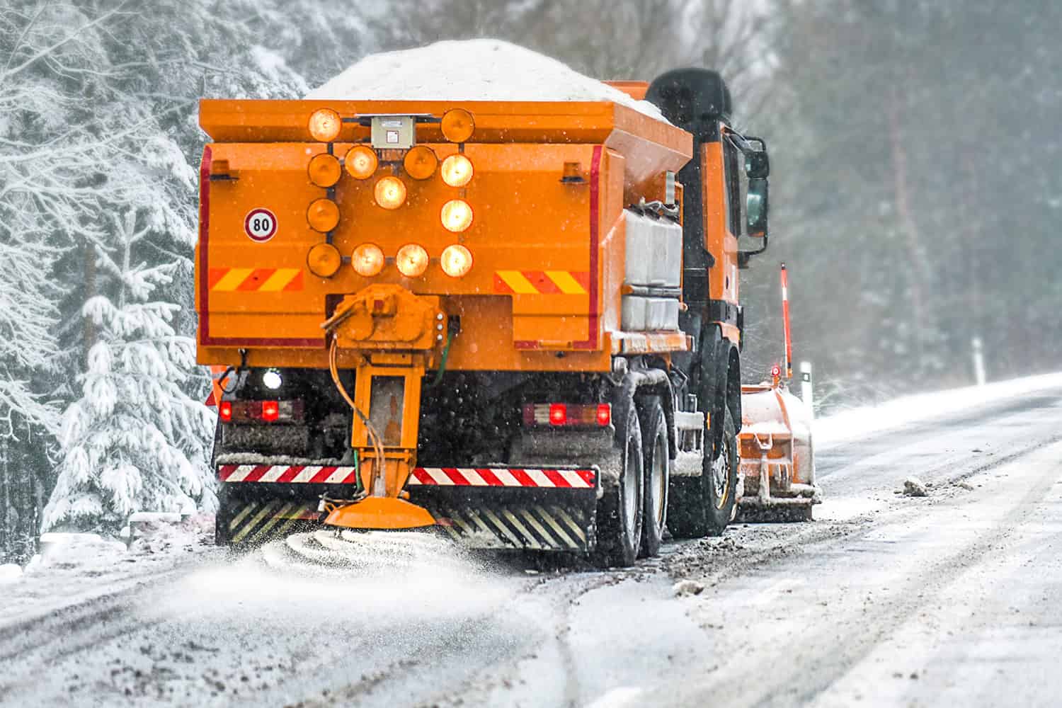 Snow,Plow,On,Highway,Salting,Road.,Orange,Truck,Deicing,Street.